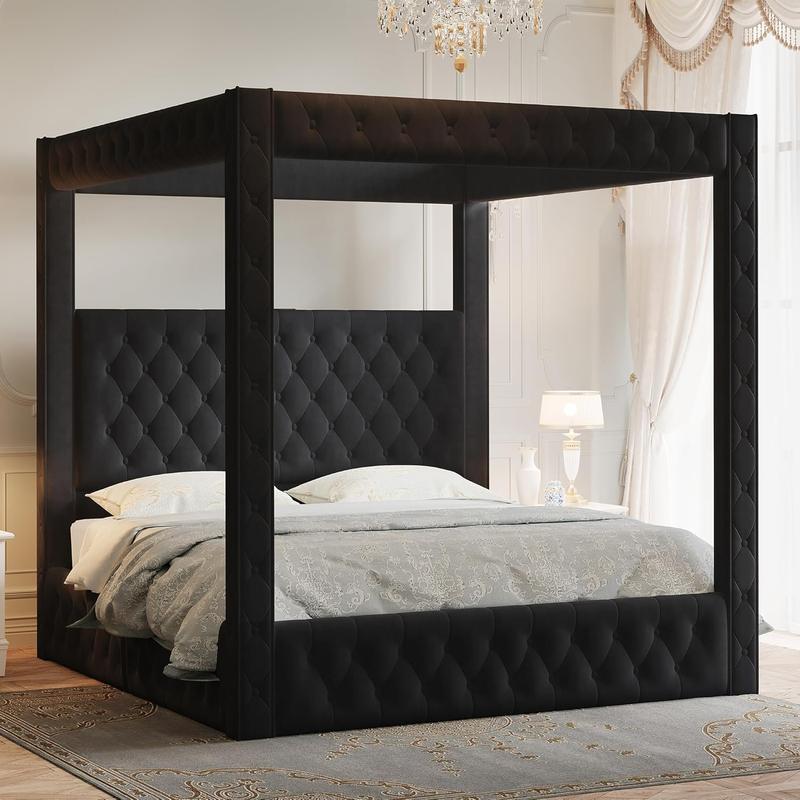 Black velvet canopy bed frame with tall tufted headboard